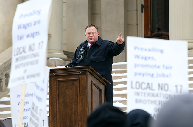 State Rep. Scott Dianda (D-Calumet) speaks to workers in support of Michigan’s prevailing wage laws at a rally at the Capitol in Lansing on Wednesday, Jan. 10, 2018.