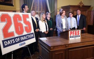 State Rep. Winnie Brinks (D-Grand Rapids) calls for immediate action on PFAS issues throughout the state. She is joined, from left to right, by state Reps. Yousef Rabhi (D-Ann Arbor), Sheldon Neeley (D-Flint), Donna Lasinski (D-Scio Township), Kevin Hertel (D-St. Clair Shores), Bill Sowerby (D-Clinton Township) and Tom Cochran (D-Mason). Directly behind stands House Democratic Floor Leader Christine Greig (D-Farmington Hills).