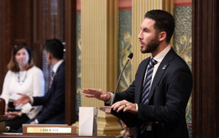 State Representative Abdullah Hammoud (D-Dearborn) speaking in support of House Bill 5159 on the House floor at the Capitol in Lansing on Thursday, Feb. 6, 2020 (Courtesy of MI House Democrats Photo Archive).