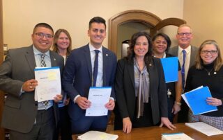 State Reps. Alex Garza (D-Taylor), Sara Cambensy (D-Marquette), Darrin Camilleri (D-Brownstown), Angela Witwer (Delta Township), Leslie Love (D-Detroit), Jim Haadsma (D-Battle Creek) and Sheryl Kennedy (D-Davison) introducing a comprehensive package to protect mobile home residents across Michigan at the Capitol in Lansing on Feb. 26, 2020.