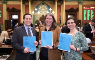 State Reps. Robert Wittenberg (D-Huntington Woods), Rachel Hood (D-Grand Rapids), Laurie Pohutsky (D-Livonia) introducing House Bills 5499-5501 to update Michigan’s sexual education curriculum on the House floor in Lansing on Feb. 18, 2020