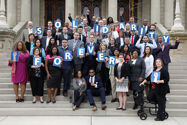 Democratic members of the House of Representatives show their support for the striking United Auto Workers members on Wednesday, September 18, 2019.