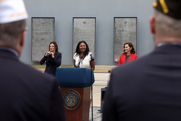 State Rep. Sarah Anthony (D-Lansing) joined Gov. Whitmer and other stakeholders for the signing of a package of bills that will remove barriers to help veterans and their families continue their careers in Michigan, on June 9, 2021.