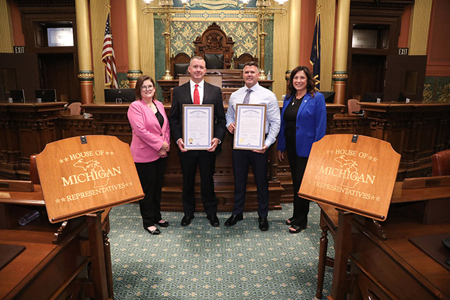 State Reps. Hope (D-Holt) and Angela Witwer (D-Delta Township) presented tributes to Lieutenant Eric Jungel and Sergeant Robert McElmurray on the floor of the Michigan House of Representatives to congratulate them on their retirement from the Ingham County Sheriff's Office, on August 26, 2021.