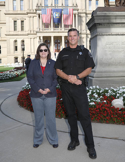 State Rep. Hope (D-Holt) and Ingham County Sheriff Scott Wriggelsworth at the Michigan House of Representatives 9/11 Commemorative Ceremony on September 9, 2021.