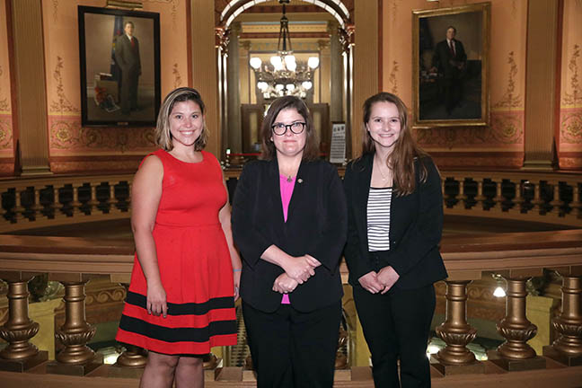 State Rep. Hope (D-Holt) and staff members Angie and Kristen in the Capitol rotunda.