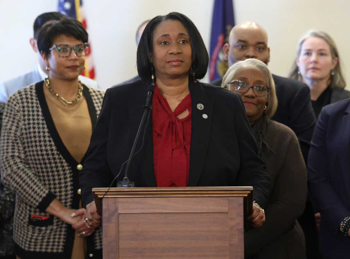 Rep. Stephanie Young (D-Detroit) takes to the podium during the Michigan Legislative Black Caucus’ press conference about police reform bills on Jan. 31, 2023.