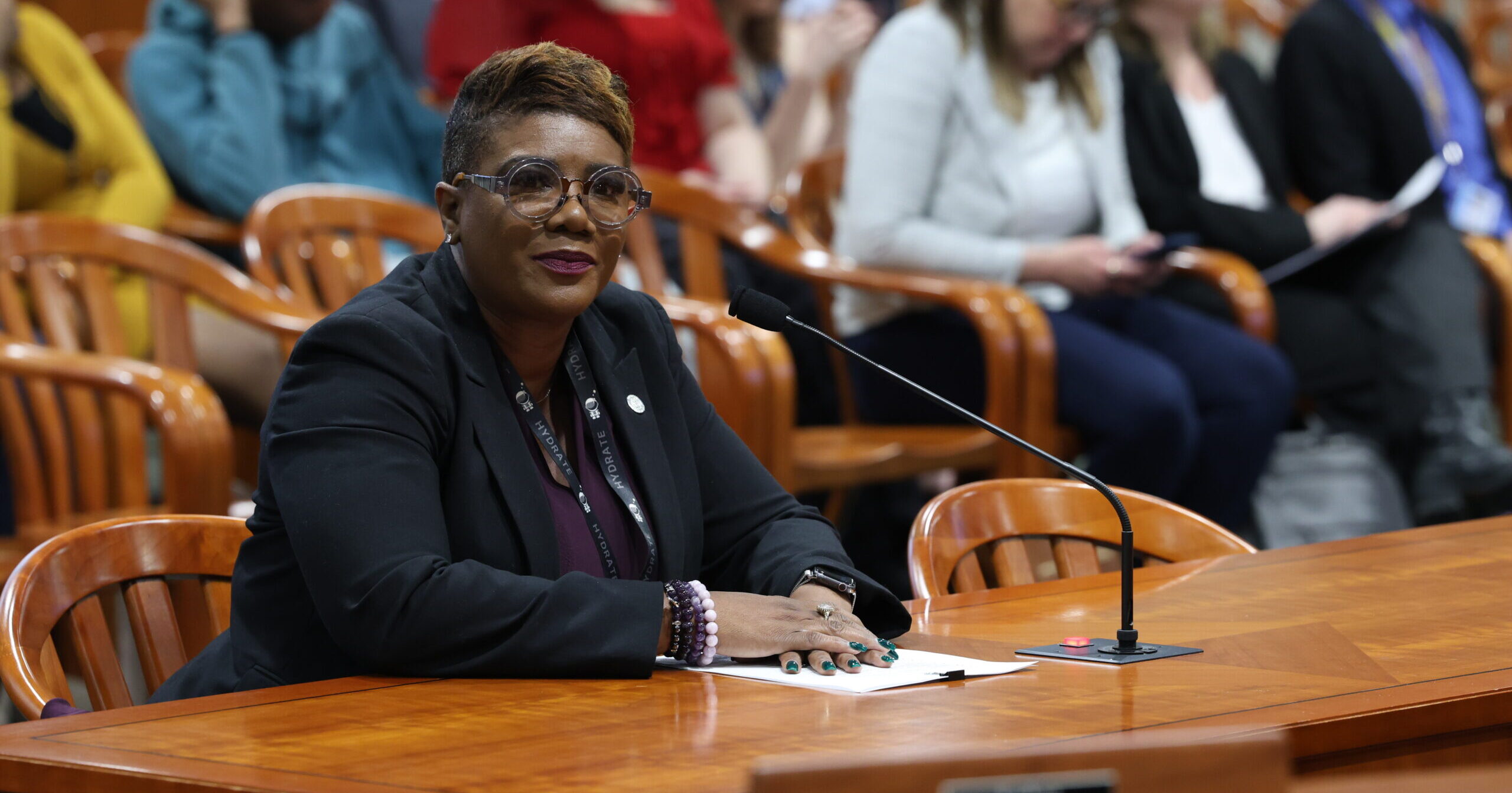 Michigan state Rep,. Cynthia Neeley sits in committee ready to give testimony