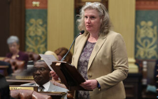 State Rep. Jenn Hill (D-Marquette) speaks in support of mental health care funding in the fiscal year 2023-24 state budget at the state Capitol on May 10, 2023.