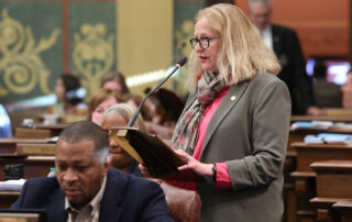 State Rep. Jennifer Conlin (D-Ann Arbor Township) speaks on the Department of Military and Veterans Affairs budget at the Michigan Capitol on Wednesday, May 10, 2023.