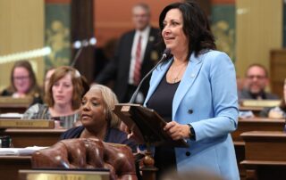 State Rep. Angela Witwer (Delta Township), chair of the House Appropriations Committee, speaks in support of the fiscal year 2023-24 budget at the Michigan Capitol on May 10, 2023.