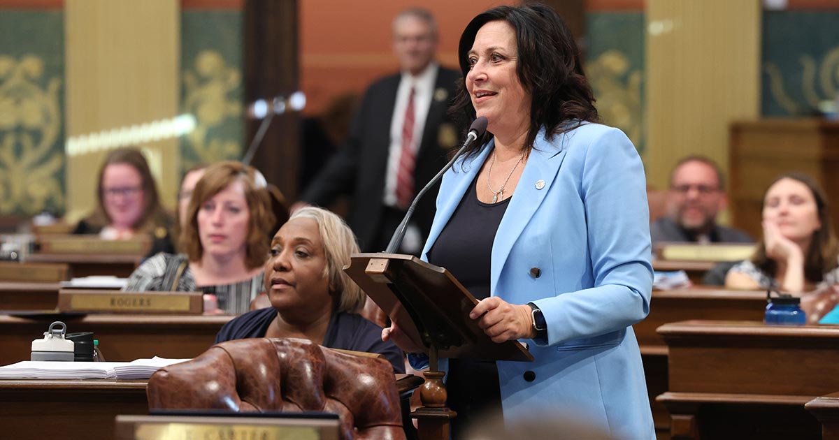 State Rep. Angela Witwer (Delta Township), chair of the House Appropriations Committee, speaks in support of the fiscal year 2023-24 budget at the Michigan Capitol on May 10, 2023.