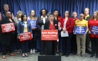 State Rep. Betsy Coffia (D-Traverse City) speaks during a press conference announcing the Safe Patient Care Act on Thursday, May 11, 2023 at the House Office Building in Lansing.