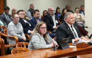 State Reps. Kelly Breen (D-Novi), left, and Bob Bezotte (R-Marion Township) testify before the House Criminal Justice Committee on their legislation to extend binding arbitration to county-level corrections officers.