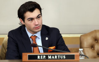 State Rep. Jasper Martus (D-Flushing) attends a House Appropriations Committee meeting at the Capitol