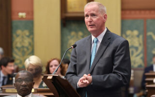 State Rep. Jim Haadsma speaks on the budget at the Michigan Capitol on Wednesday, May 10, 2023.