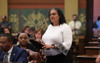 State Rep. Felicia Brabec addresses the House floor on June 14, 2023, at the Michigan State Capitol in Lansing, Michigan.