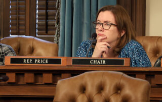 State Rep. Natalie Price (D-Berkley) listens to testimony during a committee meeting at the state Capitol in Lansing.