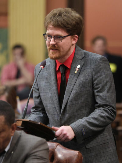 State Rep. Joey Andrews (D-St. Joseph) speaks to legislation repealing Michigan's anti-union "right-to-work" laws on March 8, 2023, at the state Capitol in Lansing.