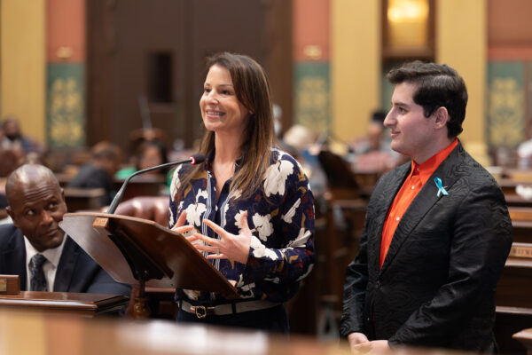 State Rep. Samantha Steckloff (D-Farmington Hills), center, joined by state Rep. Noah Arbit (D-West Bloomfield), right, speaks on legislation to make observances like Rosh Hashanah and Yom Kippur official state holidays on Wednesday, Sept. 13, 2023 at the state Capitol in Lansing.