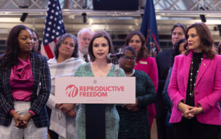 House Speaker Pro Tem Laurie Pohutsky (D-Livonia), chair of the Progressive Women’s Caucus, speaks during the Reproductive Health Act signing ceremony at Schoolcraft College in Livonia on Nov. 21, 2023.