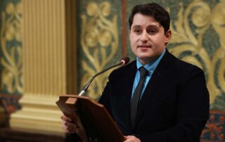 State Rep. Noah Arbit (D-West Bloomfield) speaks in favor of the Institutional Desecration Act on the House floor on June 20, 2023, at the state Capitol in Lansing. Gov. Gretchen Whitmer signed the bills into law last week.