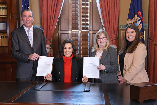 State Rep. Sharon MacDonell joined Gov. Whitmer recently for the ceremonial signing of House Bills 4352 and 4353. The bills allow MDOT to build carpool lanes on a portion of I-75.