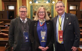 State Rep. Jennifer Conlin (D-Ann Arbor) was joined by her husband, Daniel Rivkin (right), and former editor for the New York Times, Stuart Emmrich (left), at the Michigan Capitol on Wednesday, Jan. 24, 2024.