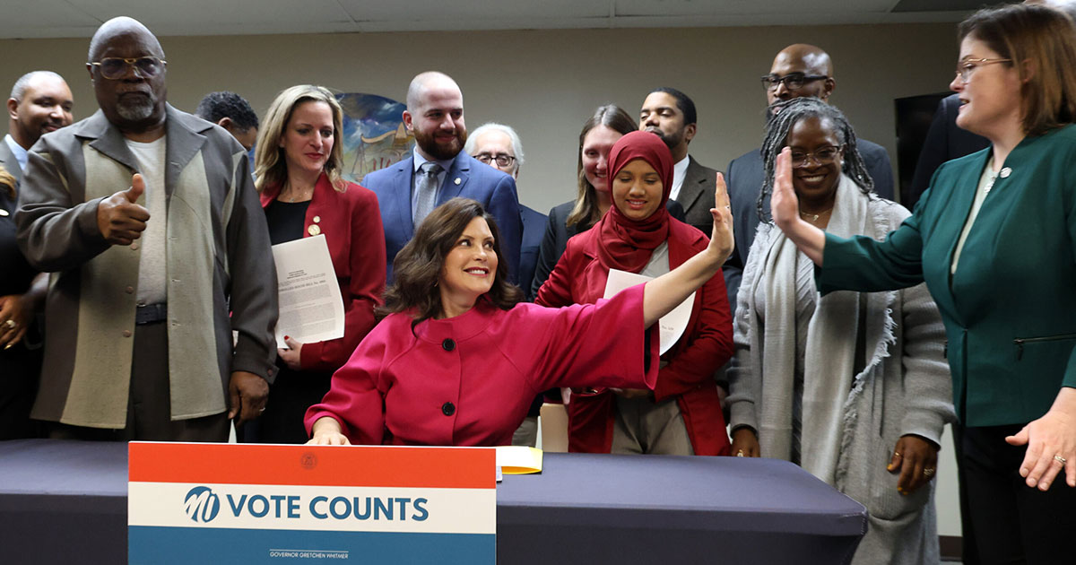 Gov. Whitmer signs election bills into law, Nov. 30, 2023, at the ACLU in Detroit.