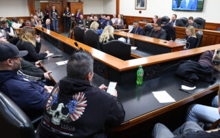 Members of the public listen to testimony of the House Labor Committee on March 8, 2023, in the House Office Building in Lansing.