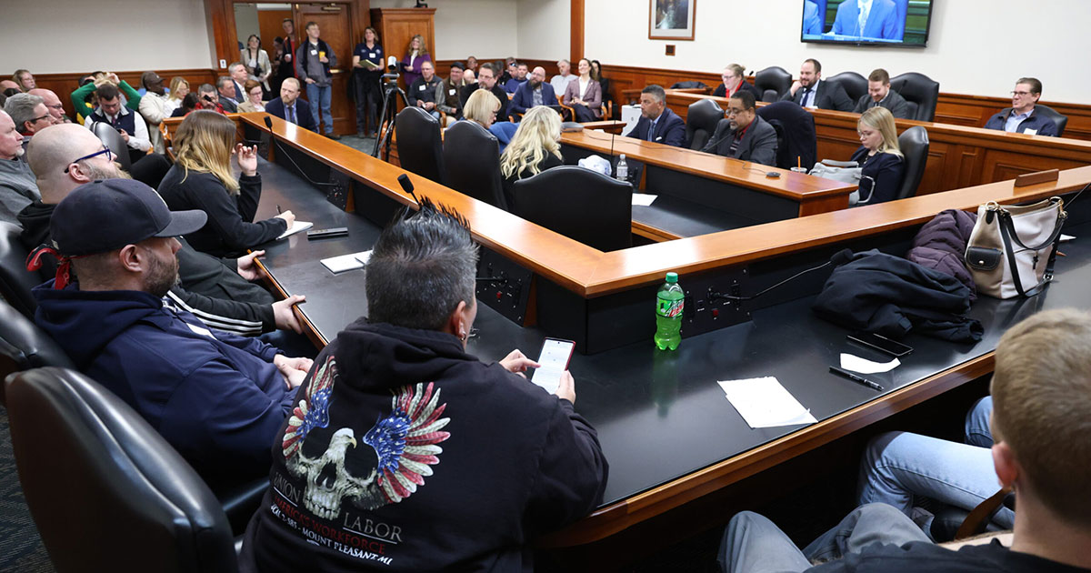 Members of the public listen to testimony of the House Labor Committee on March 8, 2023, in the House Office Building in Lansing.
