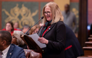 State Rep. Jennifer Conlin (D-Ann Arbor) speaks in support of her resolution declaring February 2024 as American Heart Month and designating Feb. 7, 2024, as National Wear Red Day, on Feb. 7 at the Michigan Capitol.