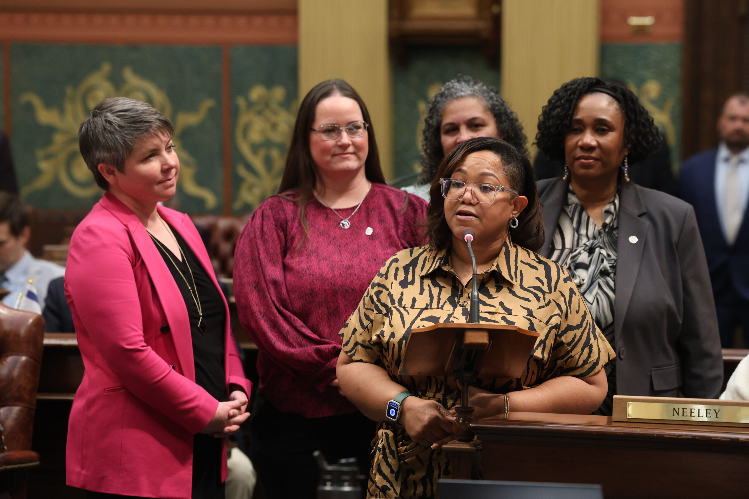 Rep. State Rep. Kimberly Edwards speaks on her resolution on the Michigan House floor, supported by state Reps. Betsy Coffia, Carrie Rheingans, Felicia Brabec and Stephanie A. Young.