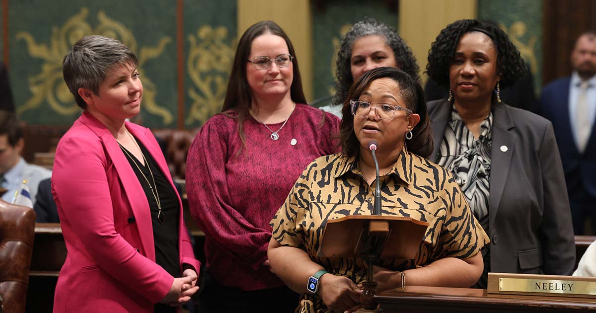 State Rep. Kimberly Edwards (D-Eastpointe), front right, speaks on her resolution, supported by, from left, state Reps. Betsy Coffia (D-Traverse City), Carrie Rheingans (D-Ann Arbor), Felicia Brabec (D-Ann Arbor) and Stephanie A. Young (D-Detroit) on Tuesday, March 5, 2024, at the Michigan Capitol in Lansing.
