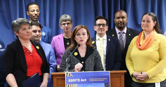 State Rep. Erin Byrnes (D-Dearborn), flanked by fellow Democratic legislators, speaks at the press conference introducing the BRITE Act legislation on Wednesday, March 13, 2024 at the House Office Building in Lansing.