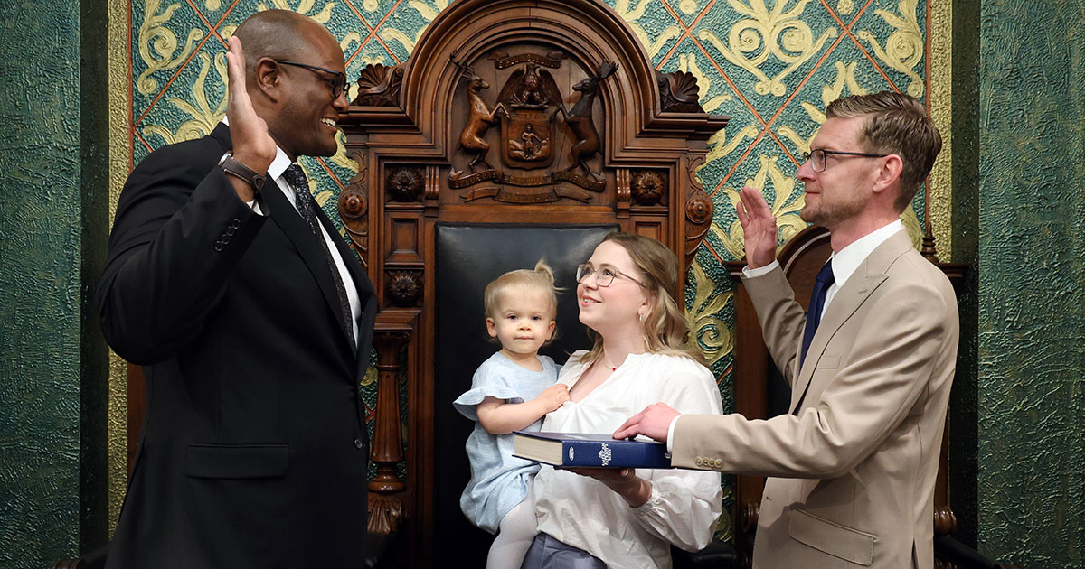 State Rep. Peter Herzberg (D-Westland) stands with family as he is sworn into the Michigan House of Representatives on April 30, 2024, on the House Floor of the Capitol in Lansing.
