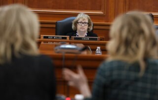 A photo of state Rep. Reggie Miller in the House Agriculture Committee.