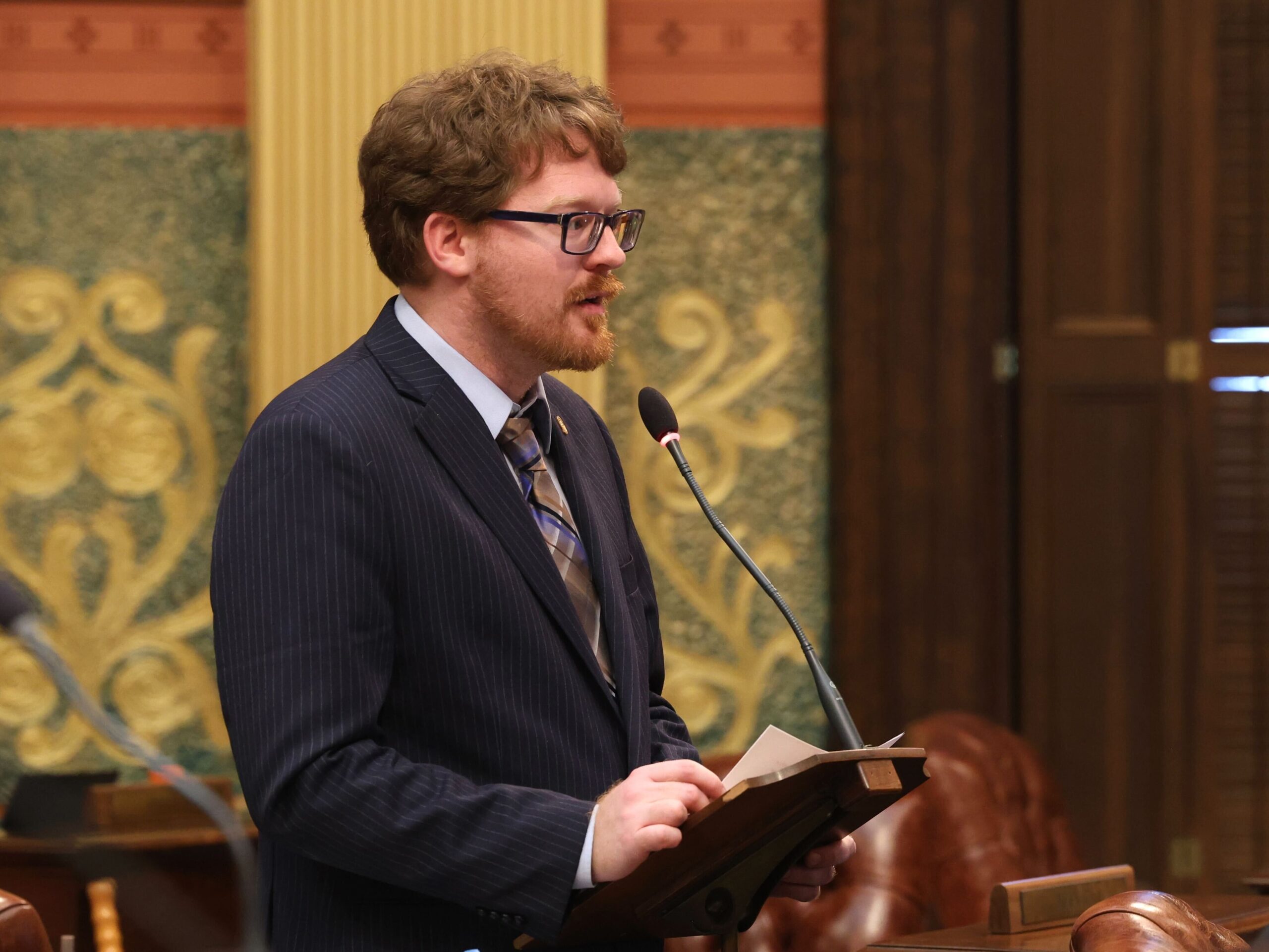 State Rep. Joey Andrews (D-St. Joseph) speaks to his amendment to increase funding for Labor and Economic Opportunity’s Going Pro fund on May 8, 2024, on the House floor at the Capitol in Lansing.