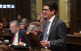 State Rep. Jason Morgan (D-Ann Arbor) speaks on the House budget at the Michigan Capitol on Wednesday, May 8, 2024.