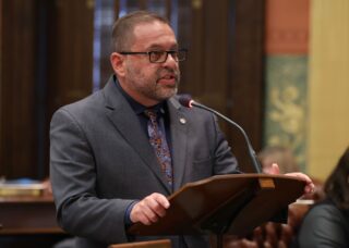 Rep. McFall speaking on house floor.