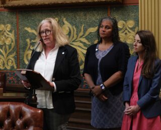 Reps. Conlin, Morse and Brabec on House Floor.