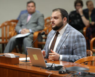 Michigan state Representative Alabas Farhat speaks at the Michigan Capitol Building in Lansing.