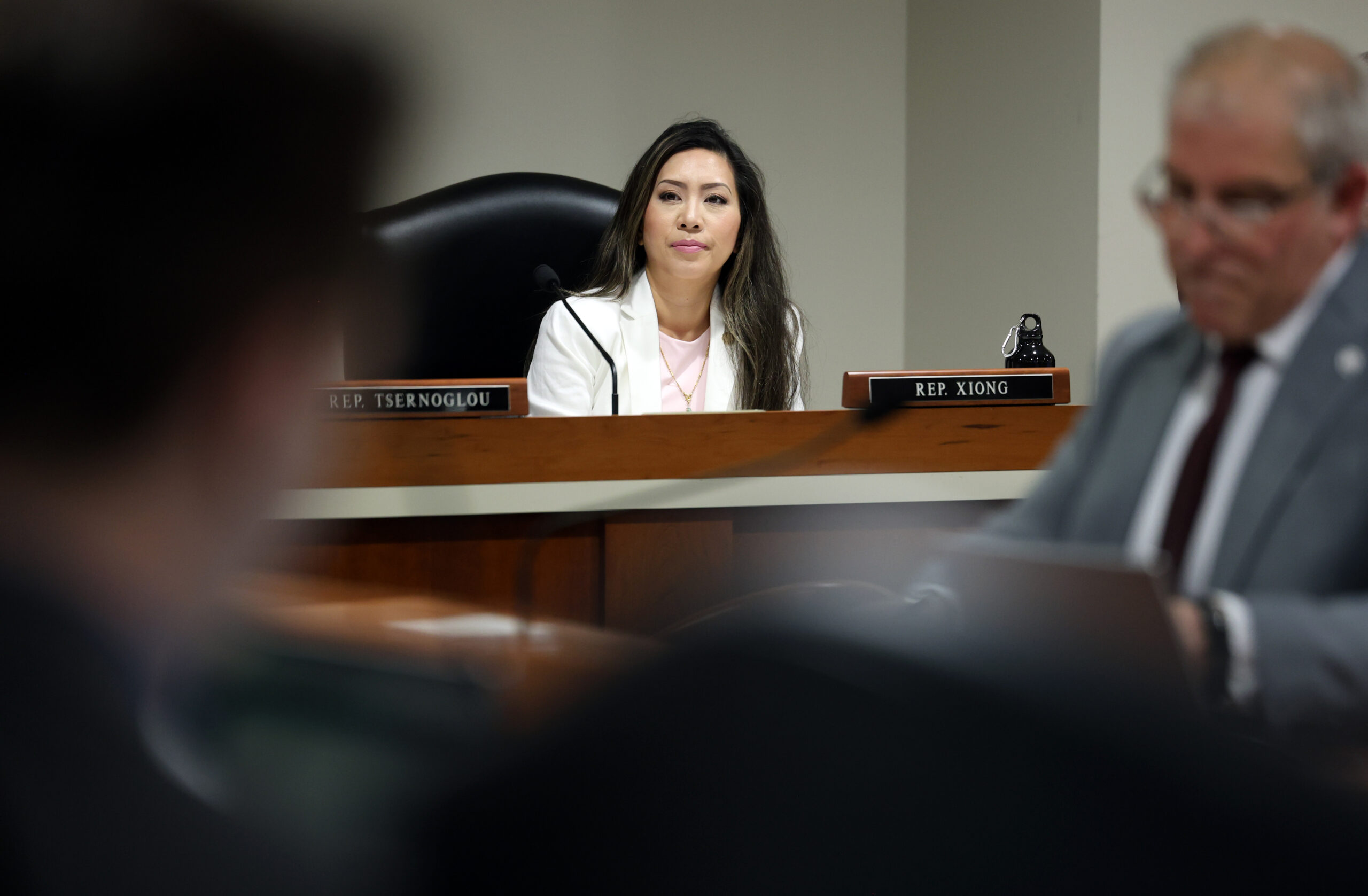 Michigan state Representative Mai Xiong sits at an Insurance Committee meeting.