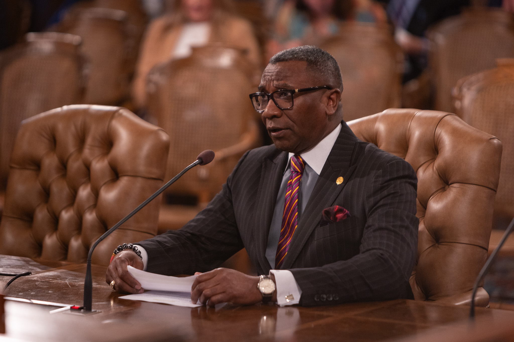 State Rep. Amos O’Neal (D-Saginaw) sits at a desk and testifies in the House Appropriations Committee on the Corrections budget on Wednesday, May 1, 2024.