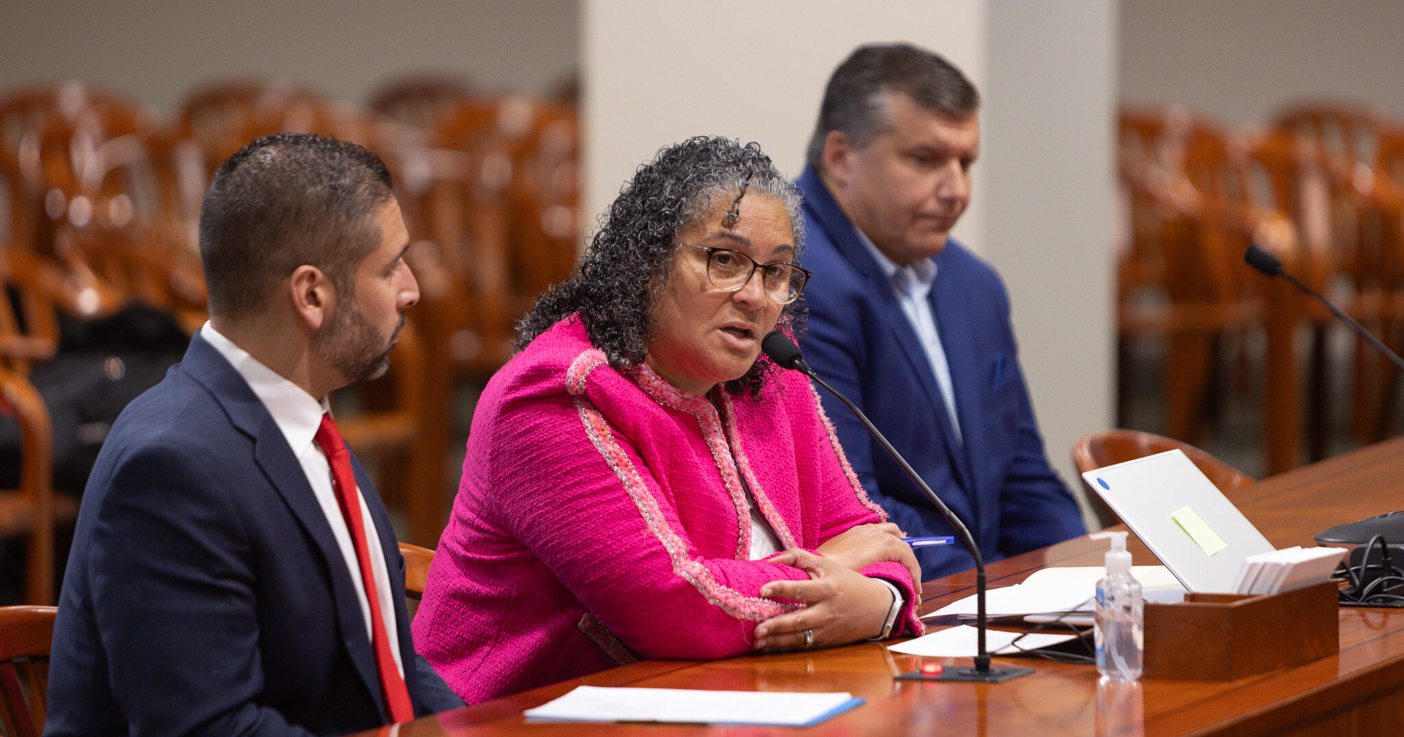 Michigan State Representative Felicia Brabec speaks into the Microphone during a committee meeting