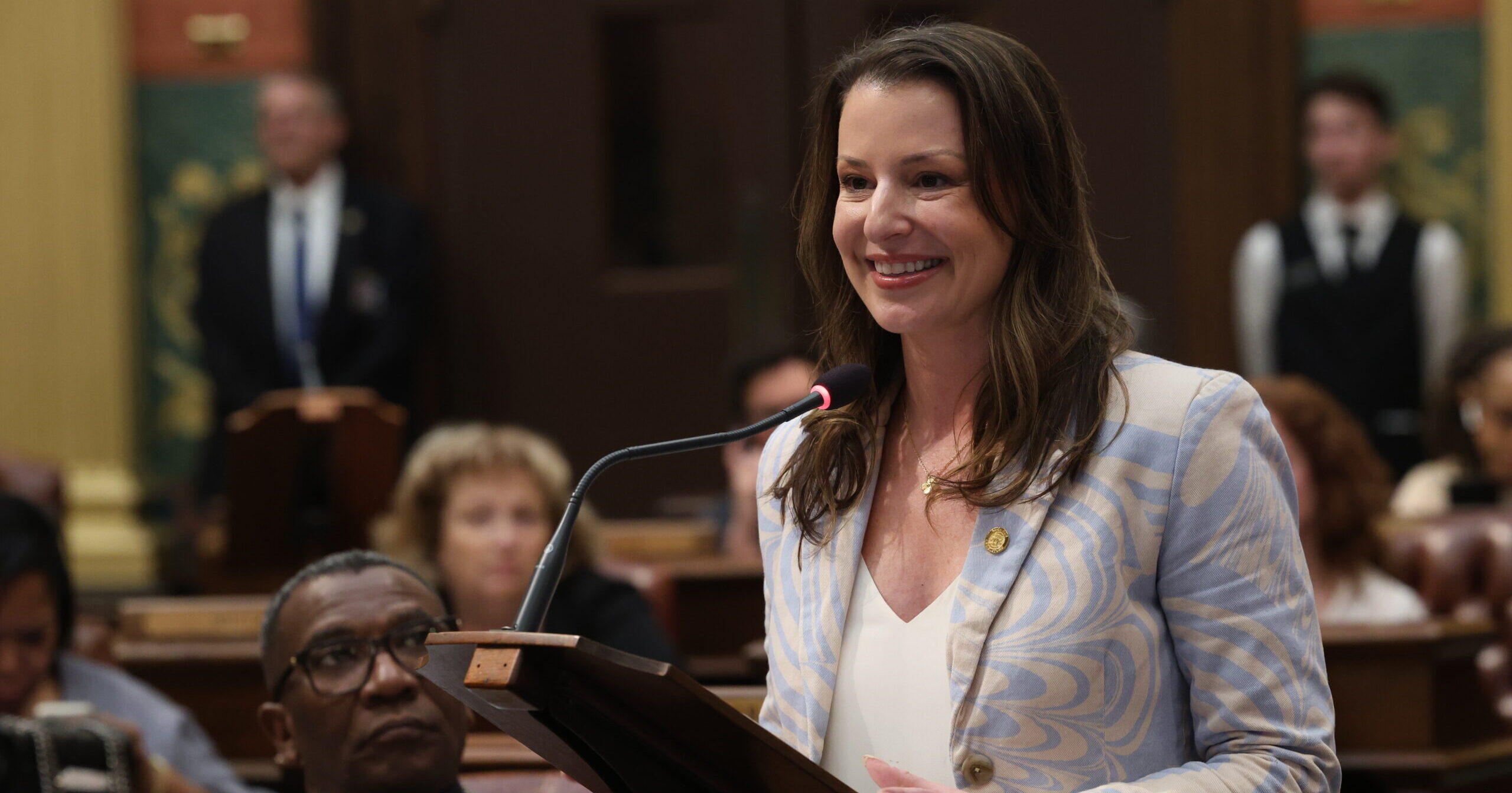 Michigan State Representative Samantha Steckloff delivers a speech on the House Floor in the State Capitol Building.