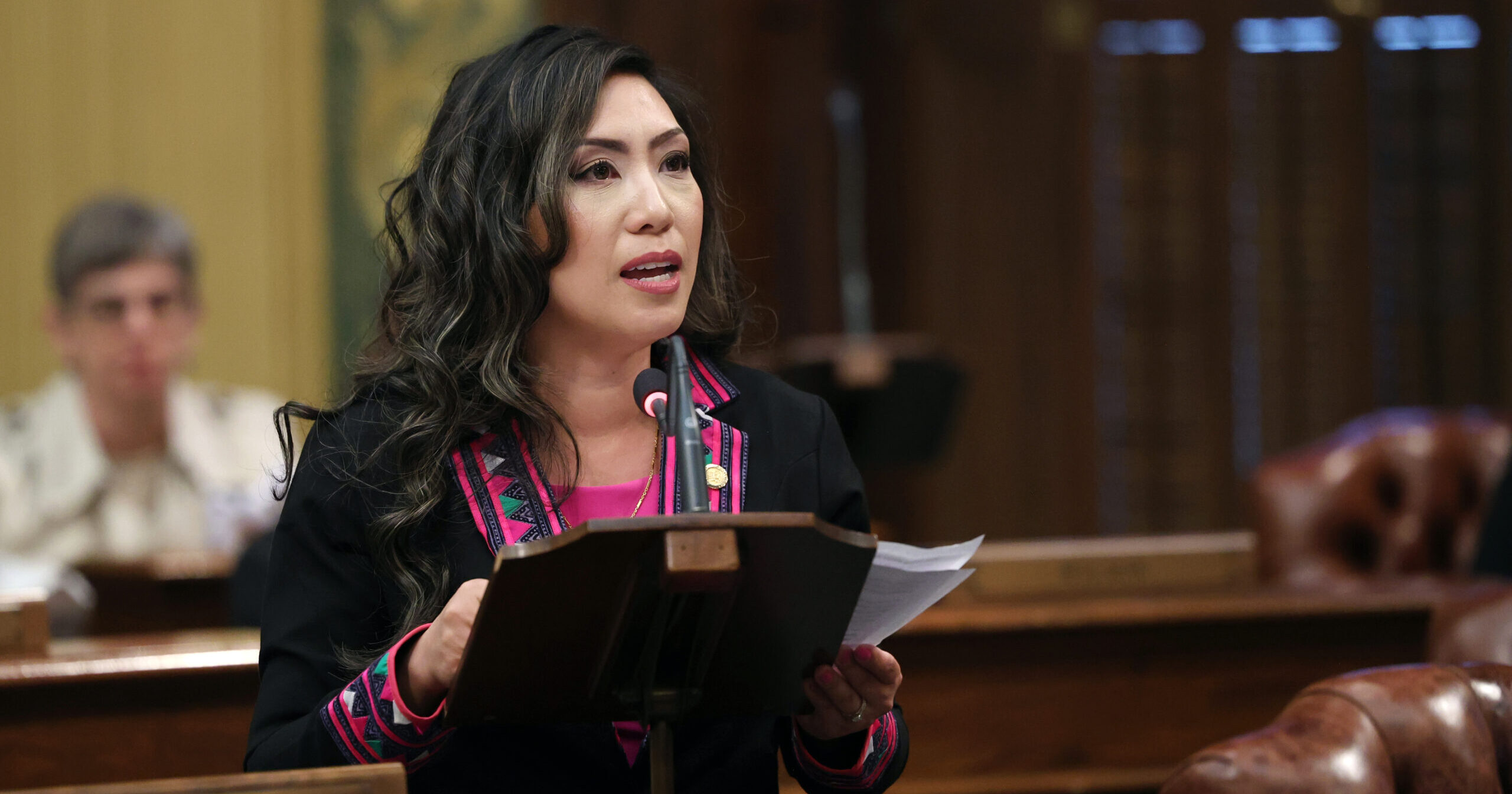 Michigan state Representative Mai Xiong delivers a speech on the House Floor.