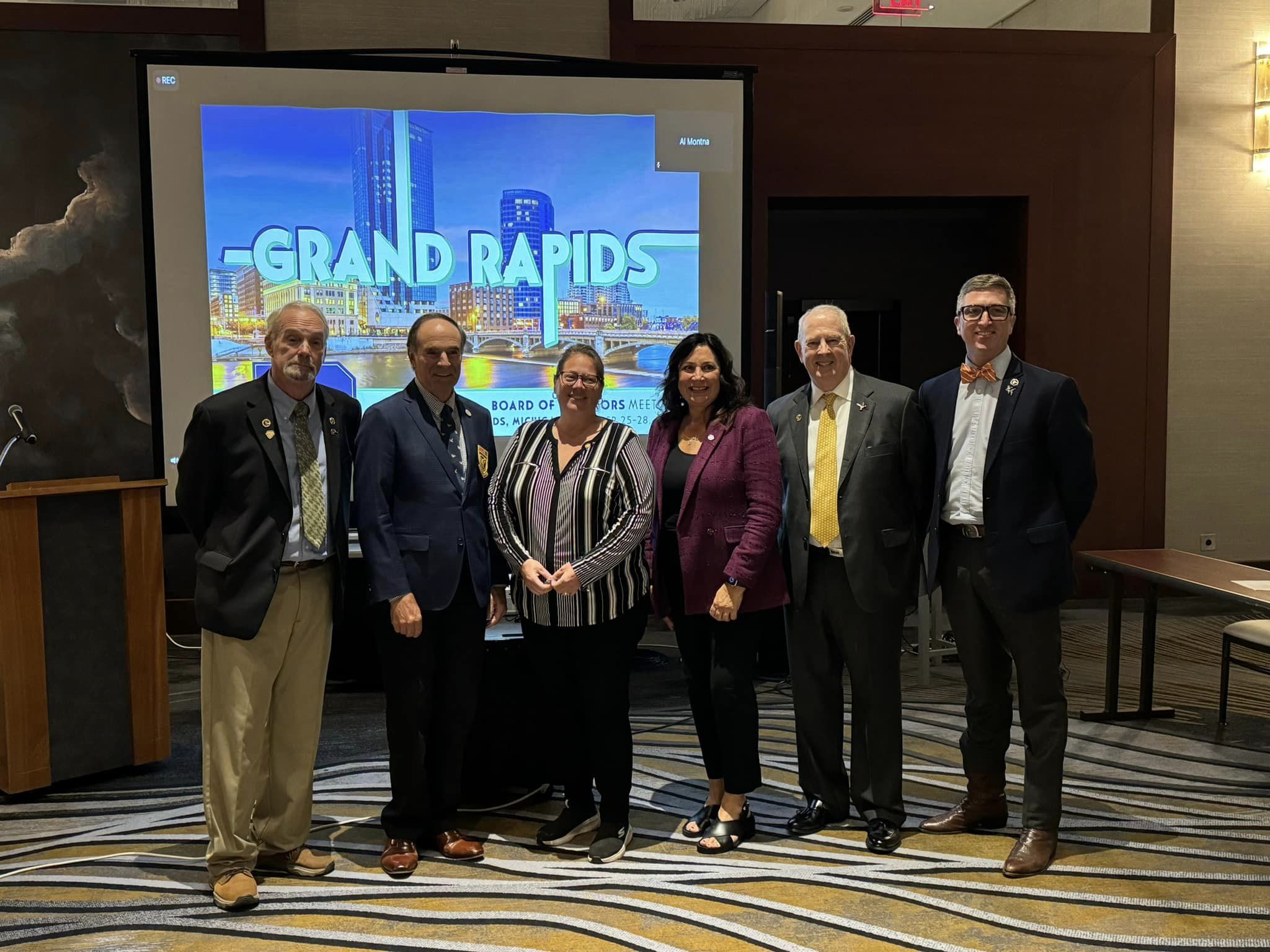 Michigan state Representative Angela Witwer stands with representatives from Ducks Unlimited to accept their Co-Legislator of the Year award.