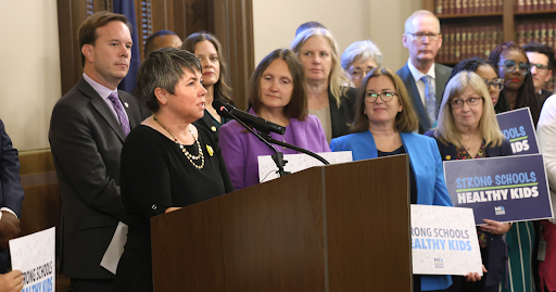 Michigan state Representative Betsy Coffia speaking at a press conference.