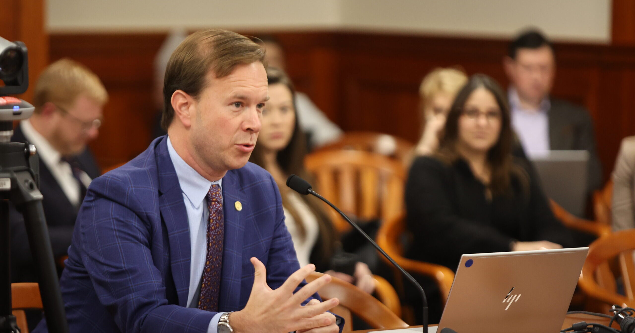 Michigan State Representative Matt Koleszar speaking in a committee meeting in the Anderson House Office Building.